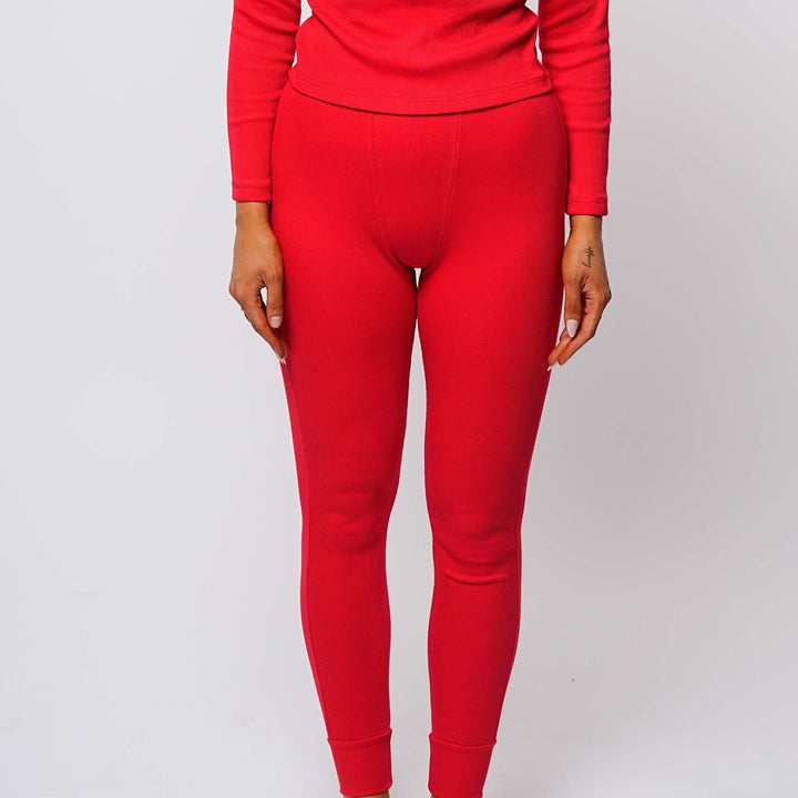 Person wearing a red outfit on a white background